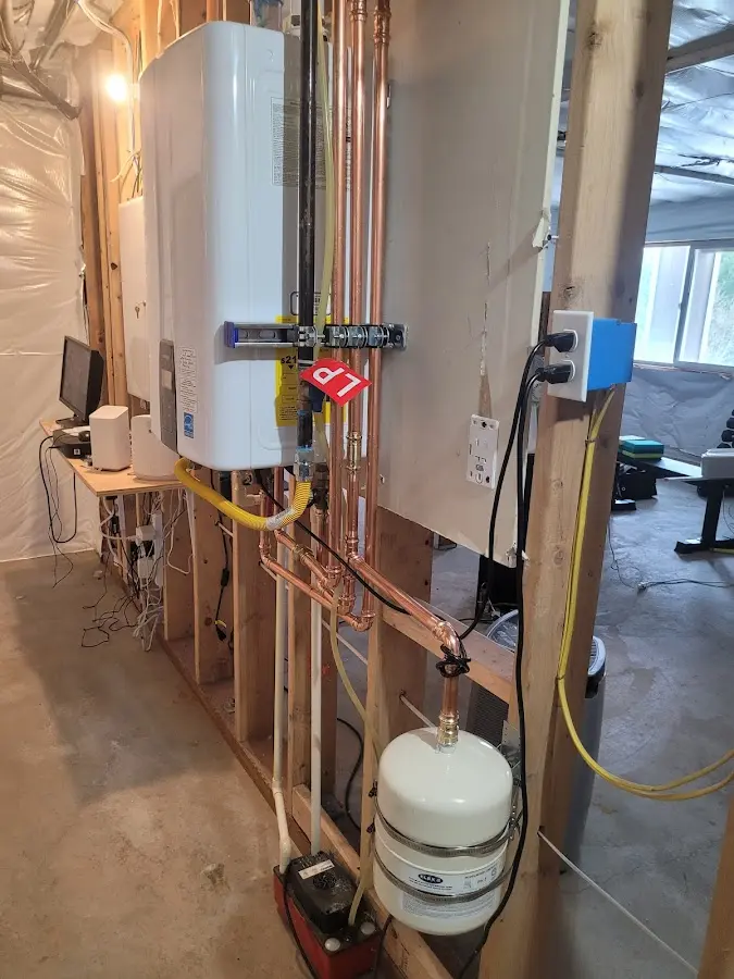 Licensed plumber repairing a kitchen sink in Nephi